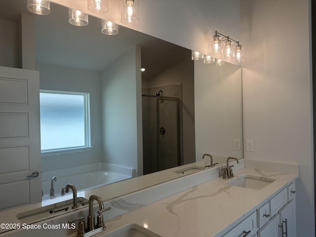 full bath with a sink, lofted ceiling, a bath, and a shower stall