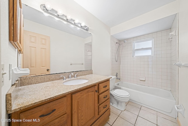 full bath with tile patterned floors, shower / bath combination, toilet, and vanity