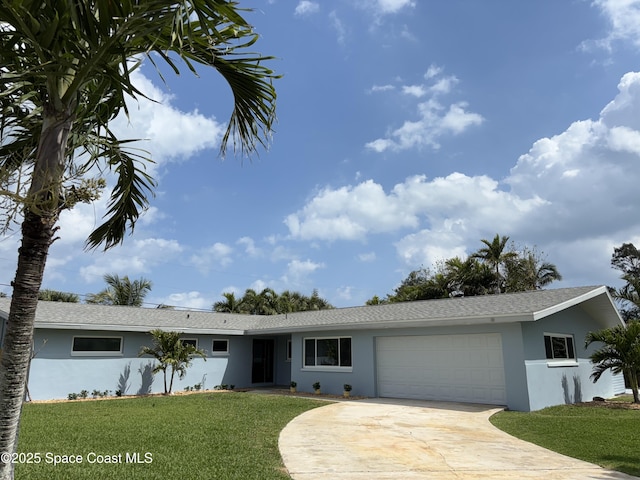 ranch-style home with a front yard, roof with shingles, stucco siding, concrete driveway, and a garage