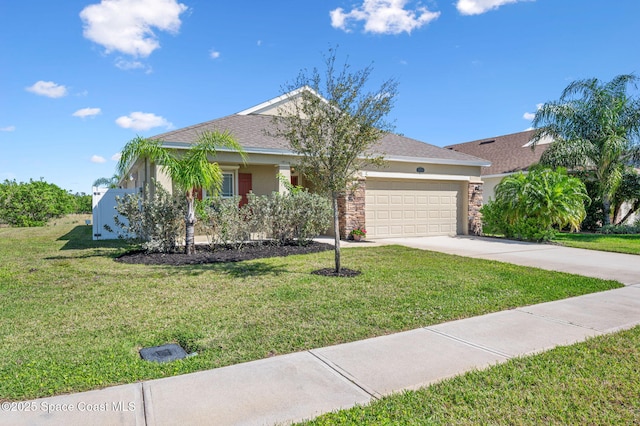 view of front of house featuring concrete driveway, an attached garage, a front lawn, and stucco siding