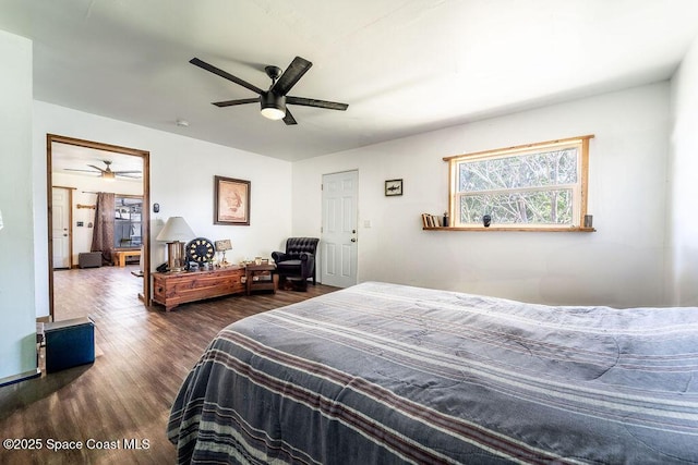 bedroom featuring a ceiling fan and wood finished floors