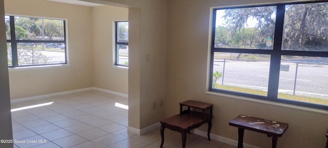 1630 S St, Titusville, FL 32780 - unfurnished room with baseboards and tile patterned flooring