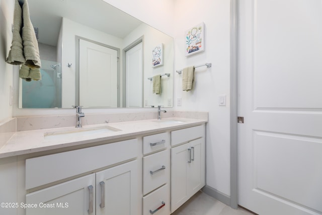 full bathroom featuring a sink and double vanity