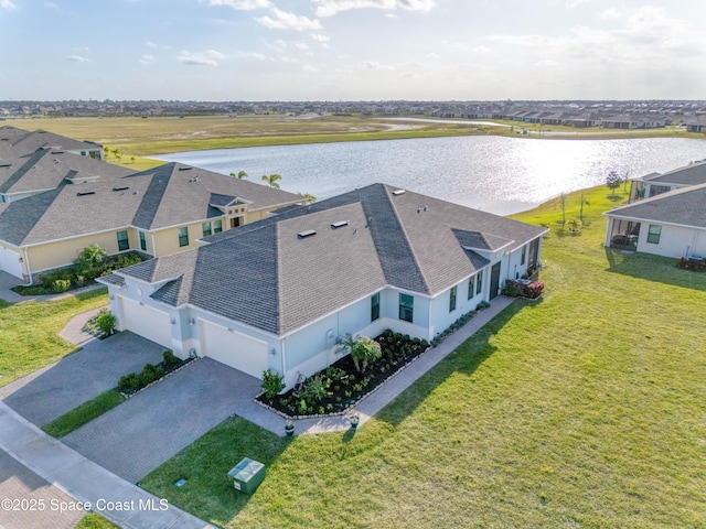 drone / aerial view featuring a water view