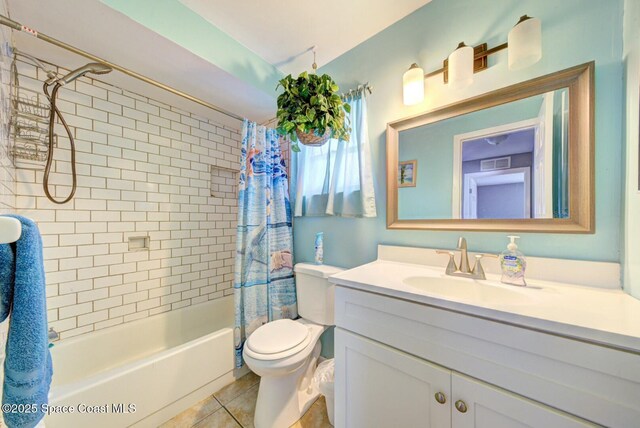 full bathroom featuring visible vents, toilet, shower / tub combo, tile patterned floors, and vanity