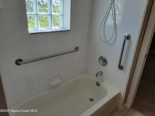 full bath with bathing tub / shower combination