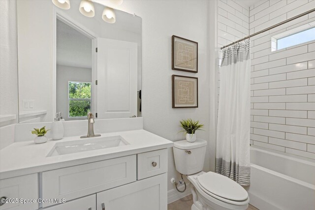 403 Fonsica St, Palm Bay, FL 32908 - bathroom featuring vanity, toilet, and shower / bath combination with curtain