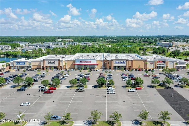 403 Fonsica St, Palm Bay, FL 32908 - aerial view of a commercial area and a tree filled landscape