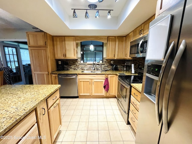 1961 Bradway St NE, Palm Bay, FL 32905 - kitchen with stainless steel appliances, a sink, tasteful backsplash, a raised ceiling, and light tile patterned floors