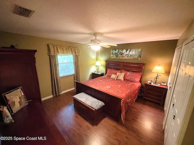 1961 Bradway St NE, Palm Bay, FL 32905 - bedroom with wood finished floors, baseboards, and a ceiling fan