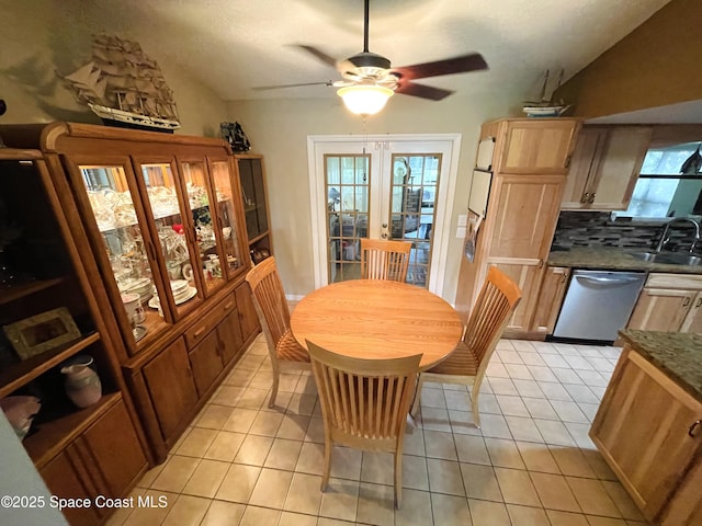 1961 Bradway St NE, Palm Bay, FL 32905 - dining area featuring lofted ceiling, ceiling fan, and light tile patterned floors