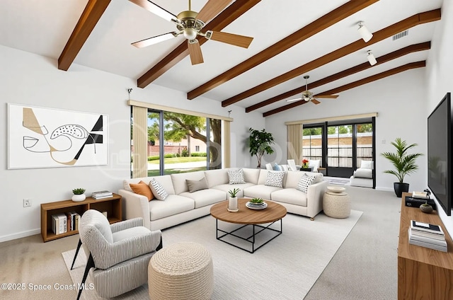 380 N 2nd St, Cocoa Beach, FL 32931 - carpeted living room with ceiling fan and baseboards