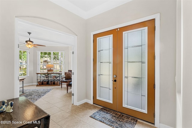 366 Gardendale Cir SE, Palm Bay, FL 32909 - entrance foyer with french doors, light tile patterned floors, baseboards, and ceiling fan