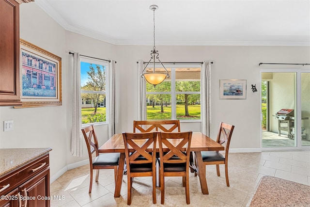 366 Gardendale Cir SE, Palm Bay, FL 32909 - dining area featuring light tile patterned flooring, baseboards, and crown molding