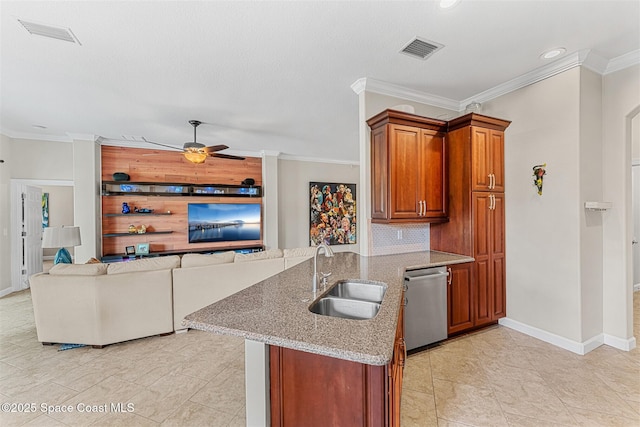 366 Gardendale Cir SE, Palm Bay, FL 32909 - kitchen with a sink, light stone countertops, a peninsula, stainless steel dishwasher, and visible vents
