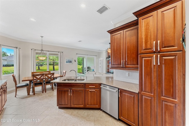 366 Gardendale Cir SE, Palm Bay, FL 32909 - kitchen with a sink, visible vents, dishwasher, a peninsula, and brown cabinetry