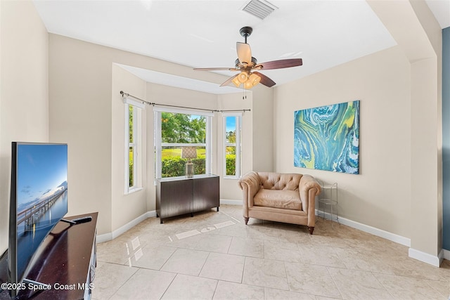 366 Gardendale Cir SE, Palm Bay, FL 32909 - living area with baseboards, ceiling fan, and visible vents