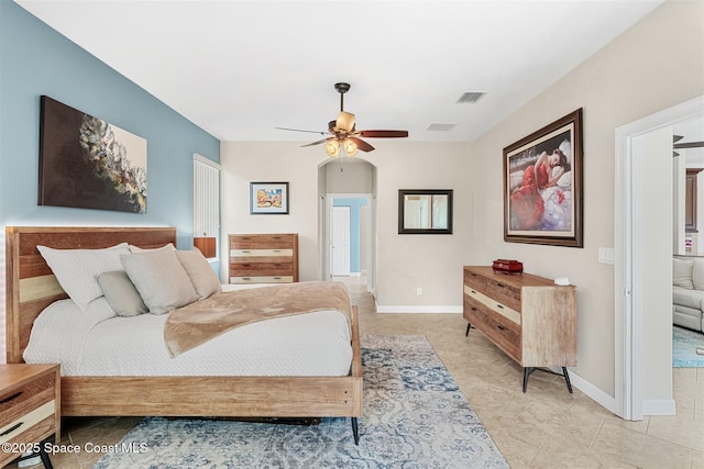 366 Gardendale Cir SE, Palm Bay, FL 32909 - bedroom with baseboards, visible vents, and ceiling fan