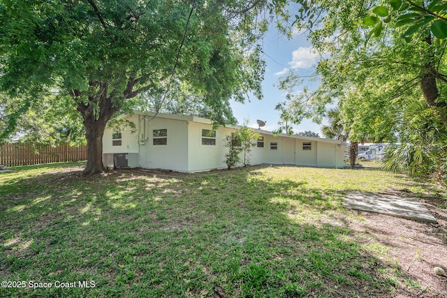 2880 Fountainhead Blvd, Melbourne, FL 32935 - back of house featuring cooling unit