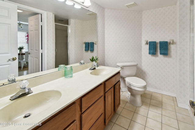 540 S Brevard Ave Unit 427, Cocoa Beach, FL 32931 - full bathroom featuring a stall shower, double vanity, and tile patterned floors