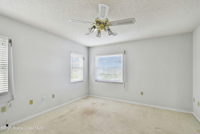 540 S Brevard Ave Unit 427, Cocoa Beach, FL 32931 - carpeted empty room featuring a textured ceiling and ceiling fan