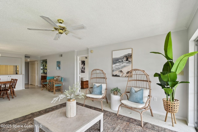 540 S Brevard Ave Unit 427, Cocoa Beach, FL 32931 - living room with a textured ceiling, carpet floors, and ceiling fan