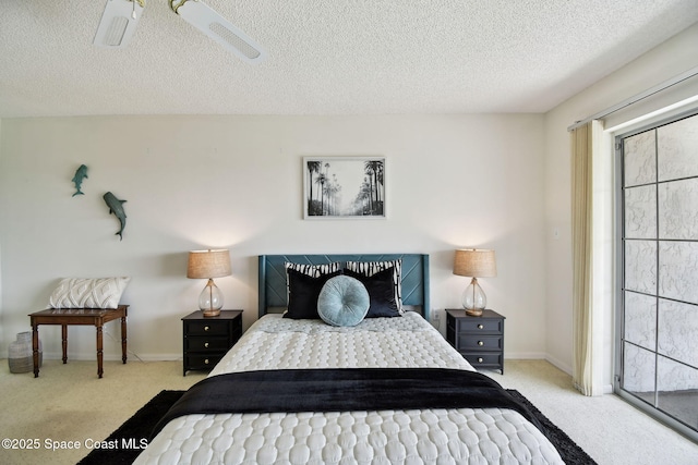 540 S Brevard Ave Unit 427, Cocoa Beach, FL 32931 - bedroom with carpet floors, a textured ceiling, and a ceiling fan