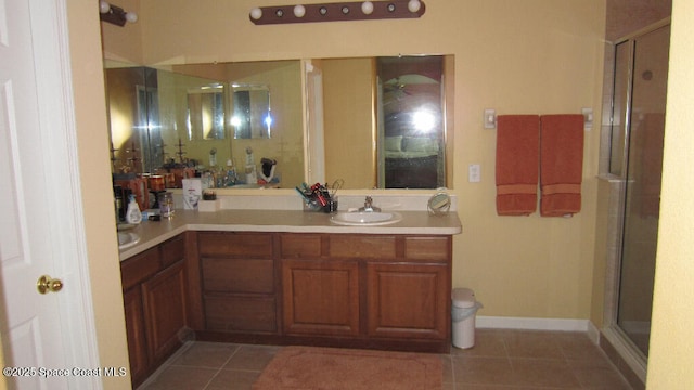 112 Broyles Dr SE, Palm Bay, FL 32909 - bathroom featuring a stall shower, vanity, and tile patterned flooring