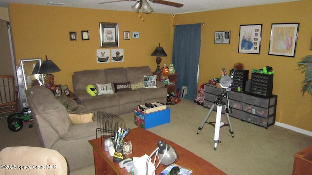 112 Broyles Dr SE, Palm Bay, FL 32909 - living room featuring carpet, baseboards, and a ceiling fan