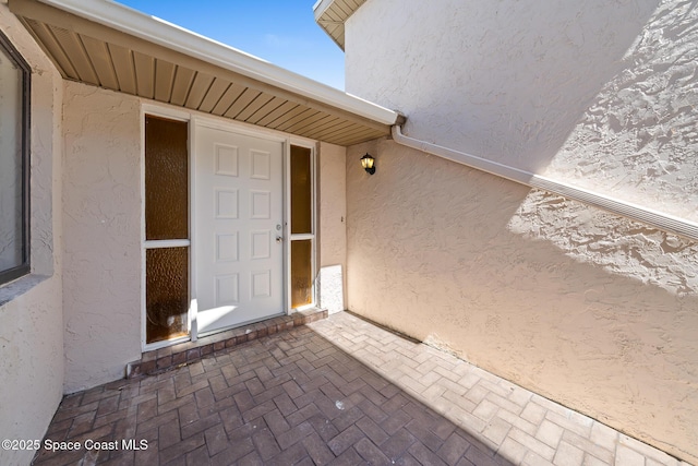 1730 Bluebird Ct, Melbourne, FL 32935 - entrance to property with stucco siding