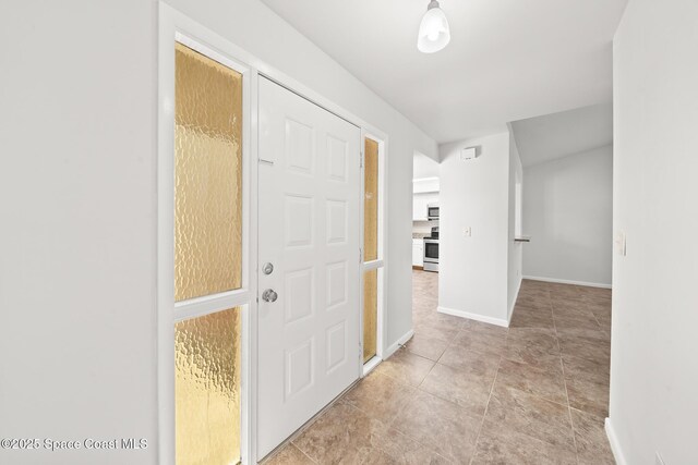 1730 Bluebird Ct, Melbourne, FL 32935 - foyer entrance featuring baseboards