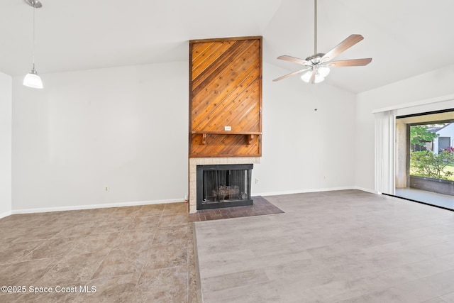 1730 Bluebird Ct, Melbourne, FL 32935 - unfurnished living room with ceiling fan, high vaulted ceiling, a fireplace with flush hearth, and baseboards
