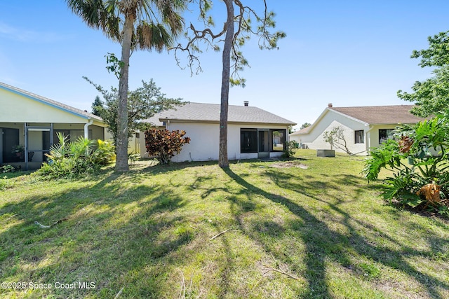 1730 Bluebird Ct, Melbourne, FL 32935 - view of yard featuring a sunroom