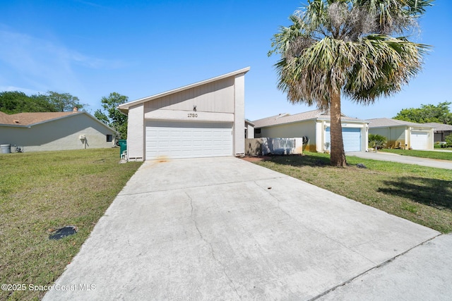 1730 Bluebird Ct, Melbourne, FL 32935 - mid-century inspired home with a front lawn and concrete driveway