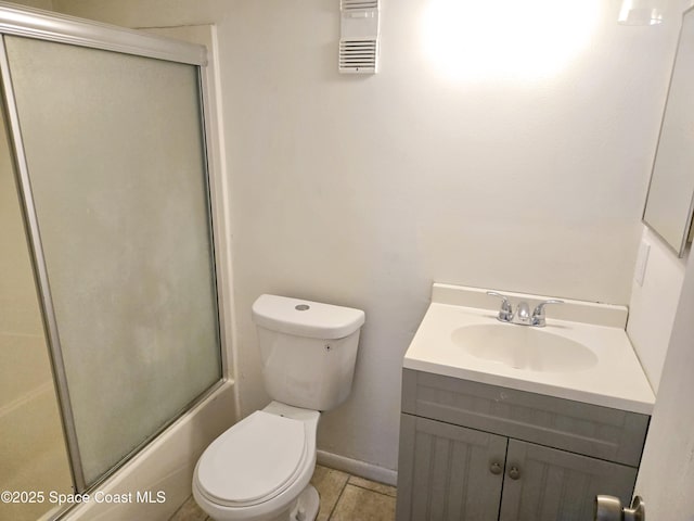 120 San Juan Cir, Melbourne, FL 32935 - full bath featuring visible vents, baseboards, toilet, combined bath / shower with glass door, and vanity