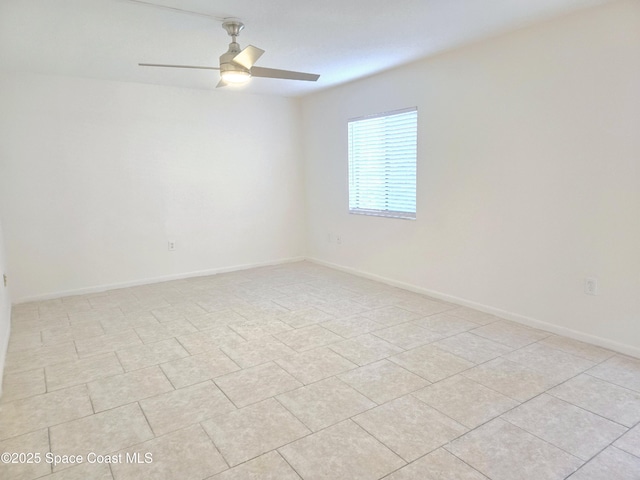 120 San Juan Cir, Melbourne, FL 32935 - empty room featuring baseboards and ceiling fan