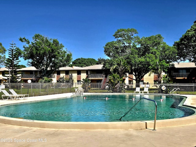 120 San Juan Cir, Melbourne, FL 32935 - community pool with a patio area and fence