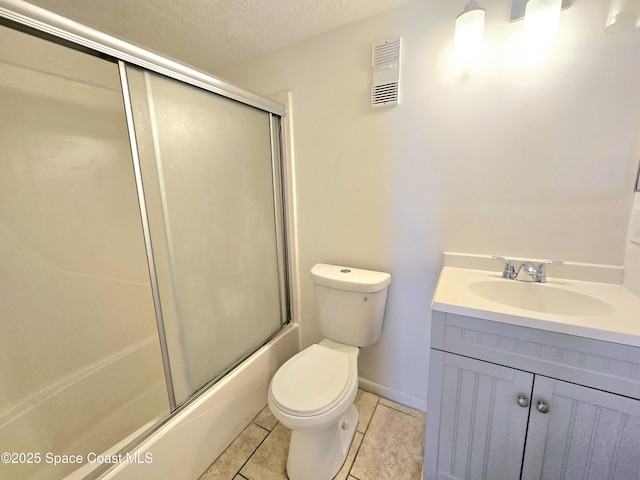 120 San Juan Cir, Melbourne, FL 32935 - full bathroom with tile patterned floors, visible vents, toilet, a textured ceiling, and vanity