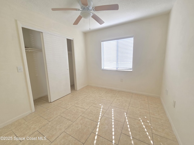 120 San Juan Cir, Melbourne, FL 32935 - unfurnished bedroom with a closet, a ceiling fan, and baseboards