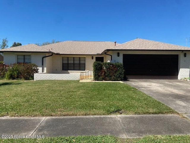 single story home featuring driveway, brick siding, a front lawn, a shingled roof, and a garage