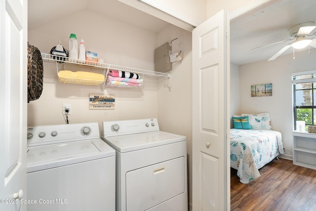 785 Luminary Cir Unit 103, Melbourne, FL 32901 - laundry room featuring independent washer and dryer, wood finished floors, and a ceiling fan