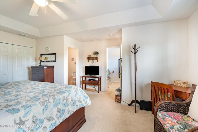 785 Luminary Cir Unit 103, Melbourne, FL 32901 - bedroom with light colored carpet, attic access, a closet, baseboards, and a ceiling fan