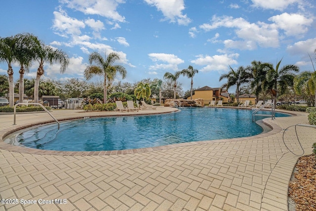 785 Luminary Cir Unit 103, Melbourne, FL 32901 - community pool featuring a patio area