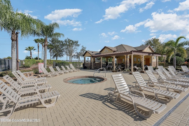 785 Luminary Cir Unit 103, Melbourne, FL 32901 - view of swimming pool featuring a hot tub and a patio area