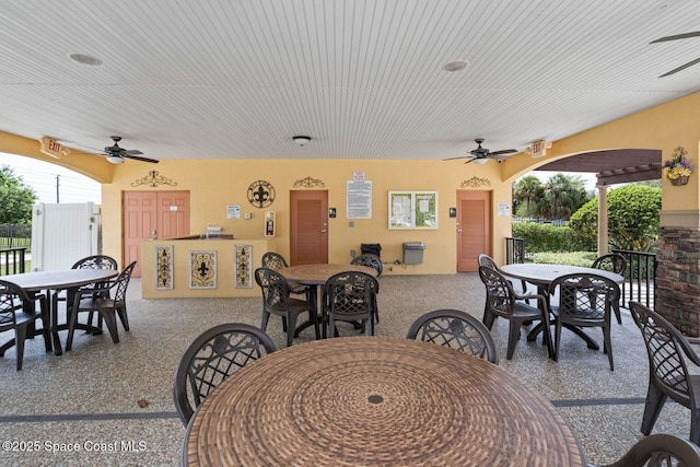 785 Luminary Cir Unit 103, Melbourne, FL 32901 - view of patio featuring outdoor dining area and ceiling fan