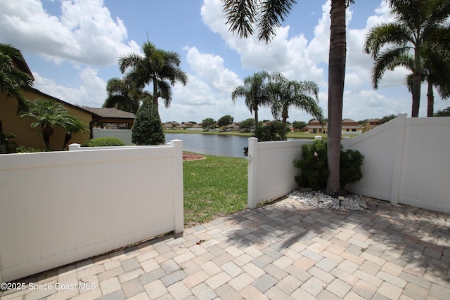 785 Luminary Cir Unit 103, Melbourne, FL 32901 - view of patio featuring a water view