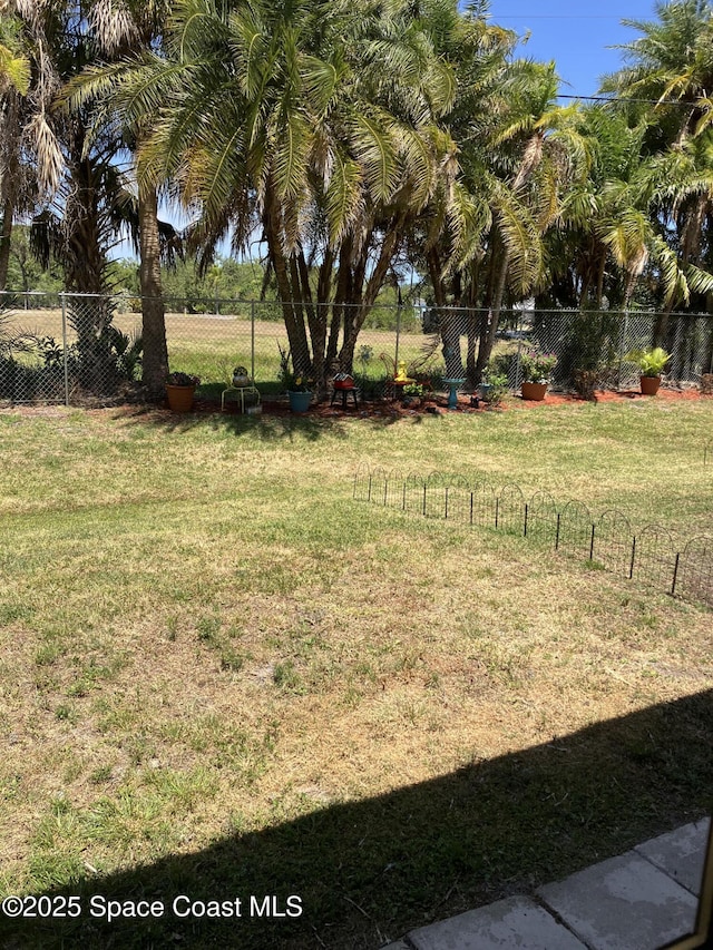 view of yard featuring fence