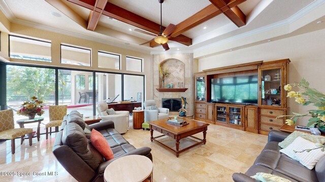 5454 Riveredge Dr, Titusville, FL 32780 - living room featuring a high ceiling, coffered ceiling, beam ceiling, a ceiling fan, and crown molding