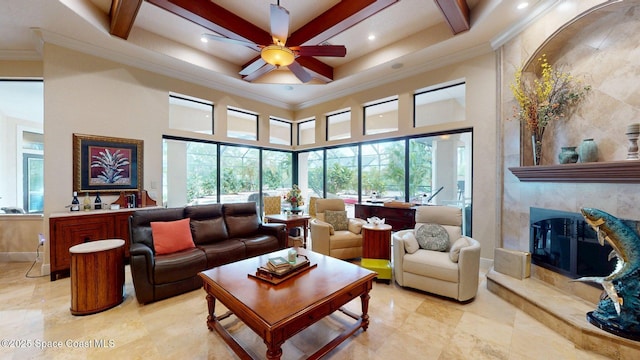 5454 Riveredge Dr, Titusville, FL 32780 - living area with a premium fireplace, ceiling fan, crown molding, beamed ceiling, and recessed lighting