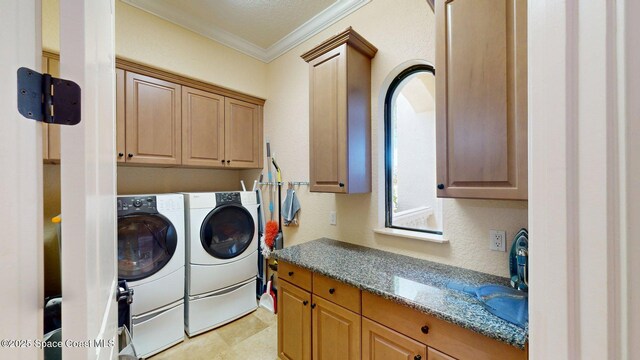 5454 Riveredge Dr, Titusville, FL 32780 - washroom featuring cabinet space, ornamental molding, and independent washer and dryer